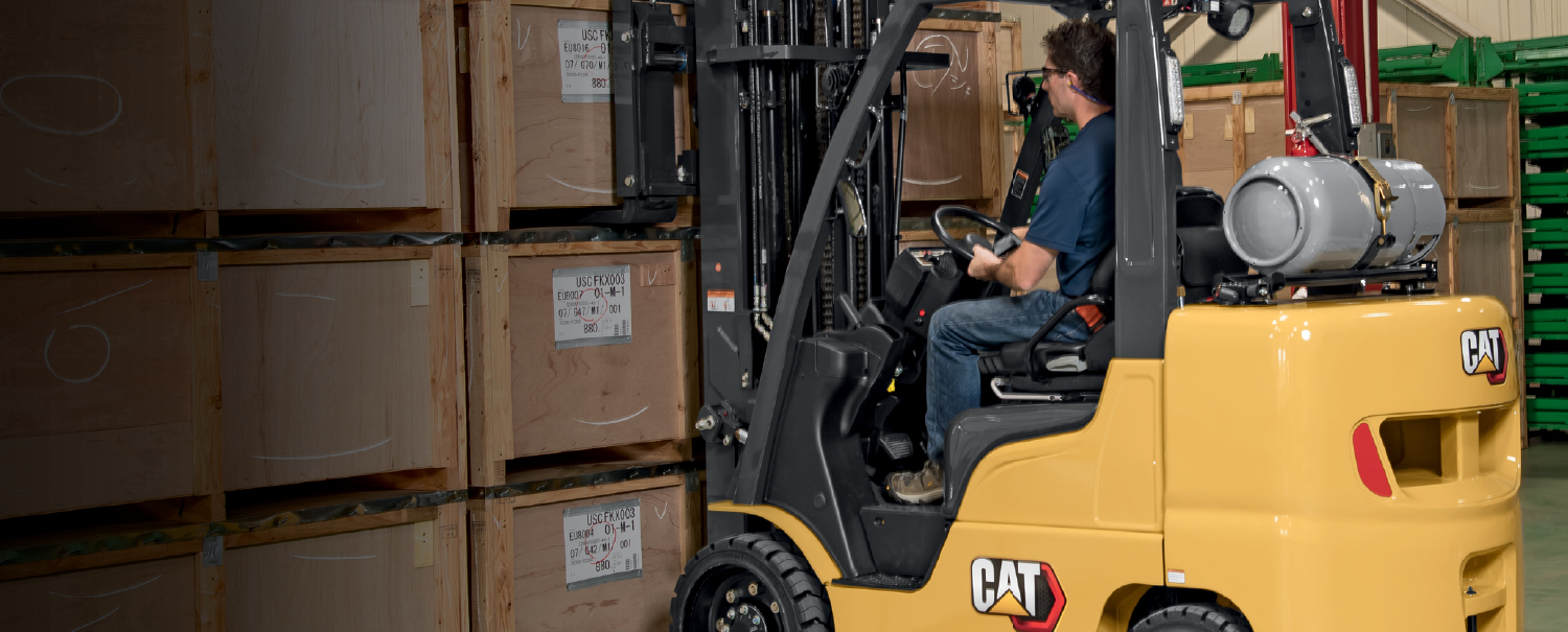 Cat IC cushion tire forklift empty in warehouse